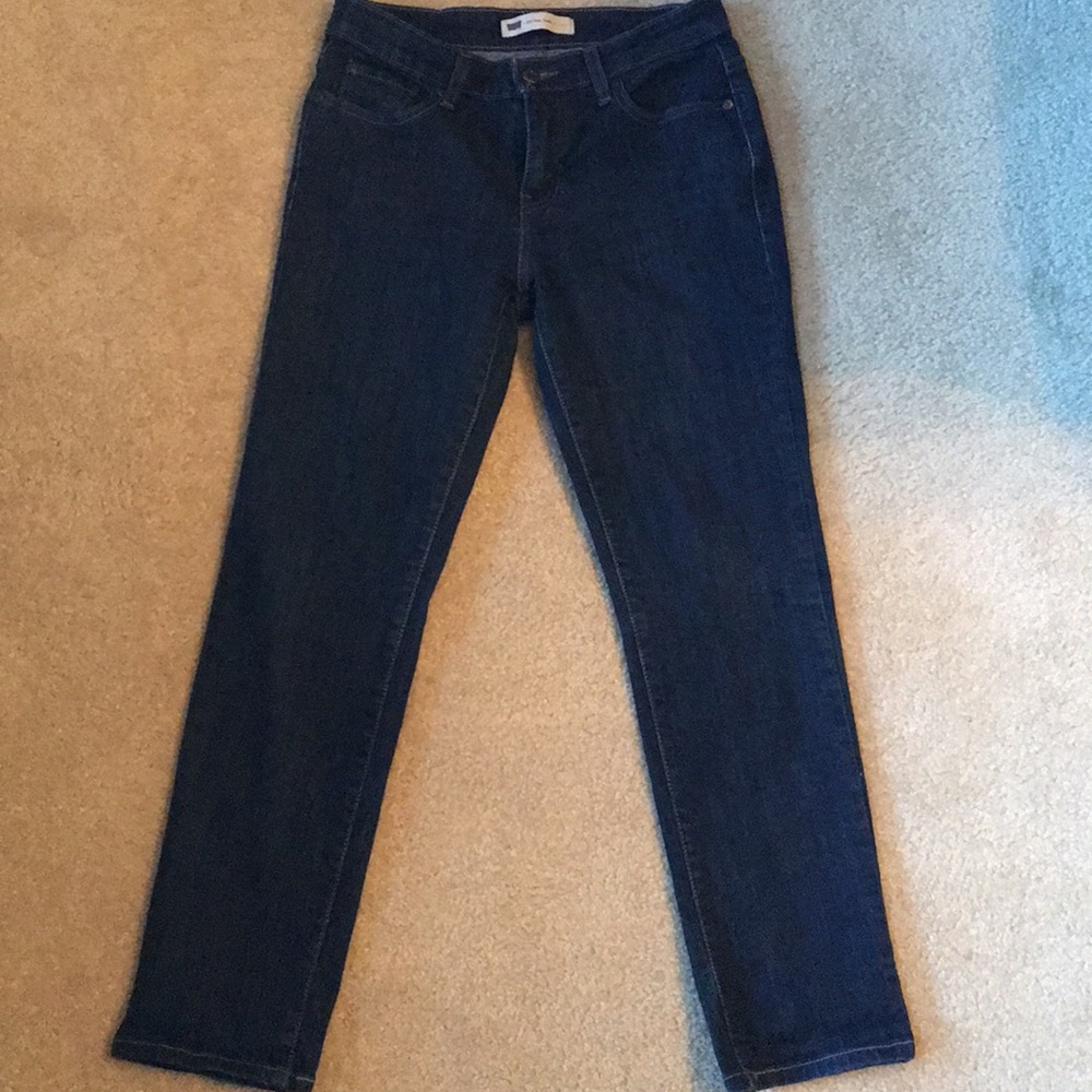 Levi’s dark wash denim jeans.